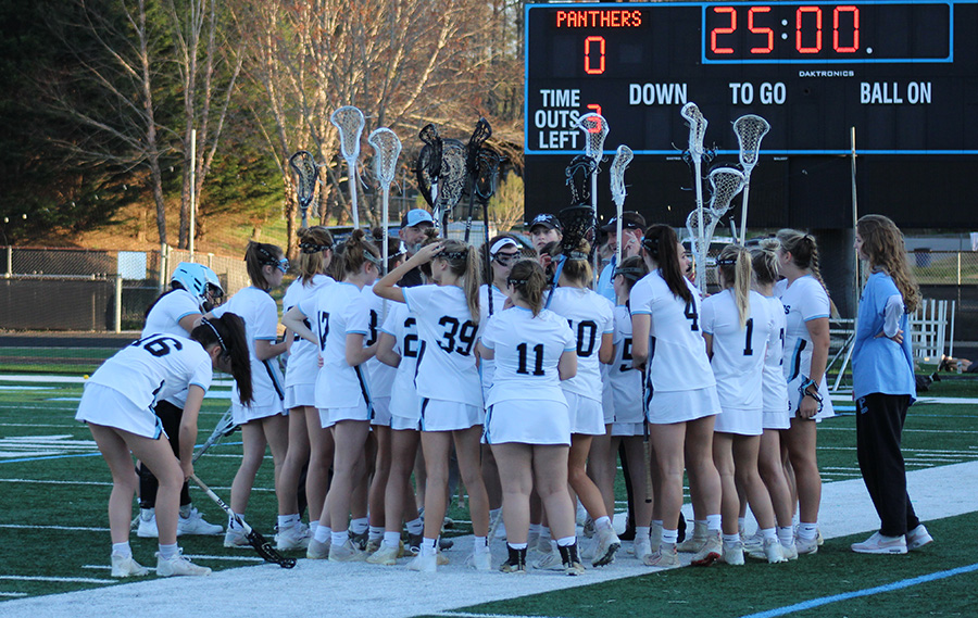 Starr’s Mill girls lacrosse team huddles together before the game. The team hosted the Creekview Grizzlies last Thursday and suffered a 17-3 loss in their second game of the season. 