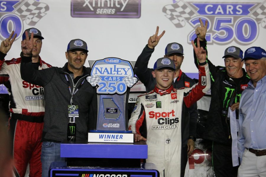 Ty Gibbs poses in Victory Lane after earning his second win of the season. After taking the lead to begin double overtime, Gibbs held off Ryan Sieg and the rest of the field in the Nalley Cars 250. “I have great relationships with all of [my teammates]. I’m very thankful,” Gibbs said. “I love Joe Gibbs Racing. It’s home.” 