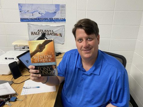History teacher and soccer coach Aaron Buck recently read “The Mentor Leader” by Tony Dungy. The book is about leadership, and what it takes for people to guide others to success. 