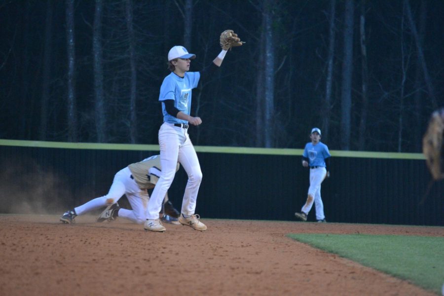 Newnan player slides into second base after an attempt to steal. The Panthers relied heavily on their defense in a commanding 11-3-1 season. 