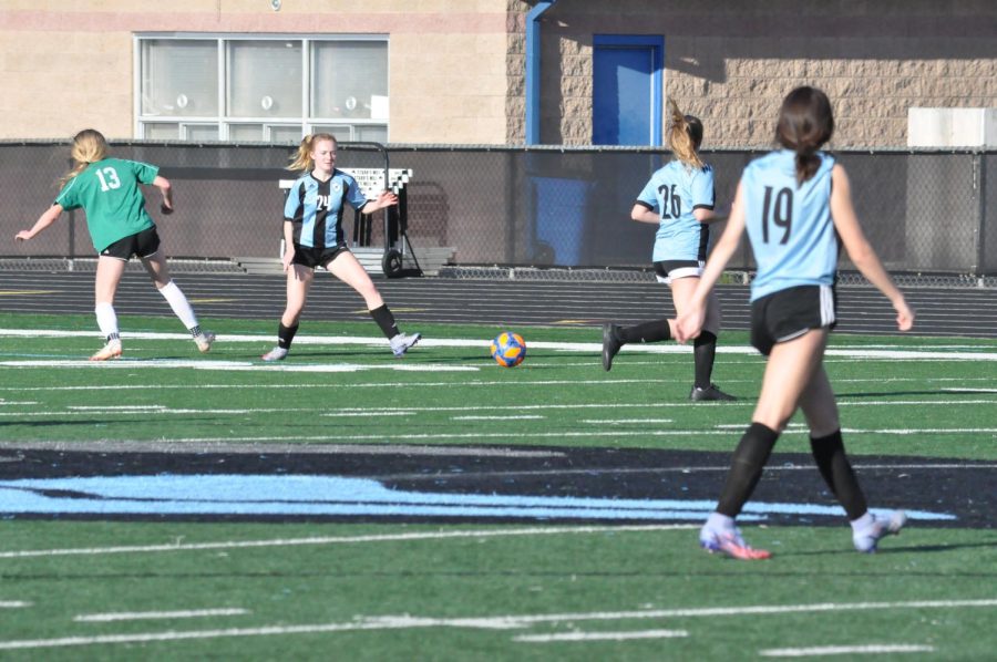 JV players pass the ball. JV girls soccer broke a Starr’s Mill record this year going undefeated, 10-0-1. Head coach Mike Meyer predicts this feat will motivate the next year’s team.