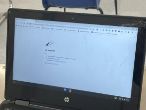 A newly bought cracked school Chromebook. Some students think that the newer Chromebooks were a wasteful investment by the school, while other students think that the pros of receiving a new Chromebook outweigh the harms.