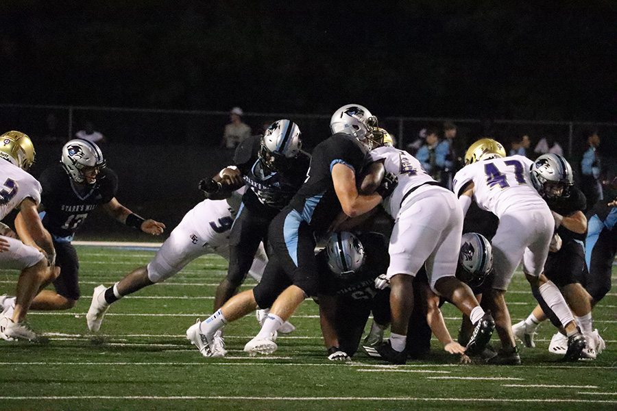 Senior Greigh Joseph runs the ball versus the East Coweta defeat. Joseph’s 133 yards on 22 carries and two touchdowns helped the Panthers defeat the Indians 27-17. The win also gave Fayette County teams a clean sweep (3-0) in the Fayette-Coweta Kickoff Classic.