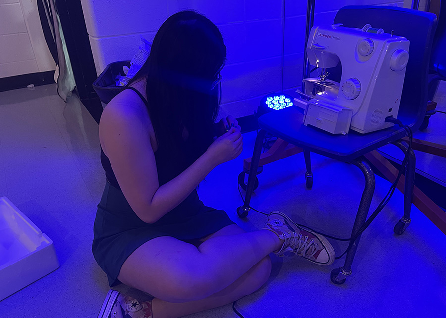 August 25, 2022 - Junior Michelle Phan fixes a sewing machine in Lauren Kuykendall’s theatre tech class. Students are already creating different outfits for this year’s drama performances.