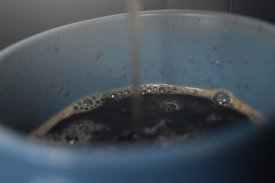 September 2, 2022 - Cup of coffee being made. Hot coffee is a great way to warm up and get a small energy boost in the morning. 