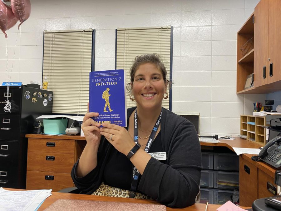 Assistant principal Elise Heaton is reading about Generation Z. She is excited to learn more about the generation and happy to help students with their needs. 