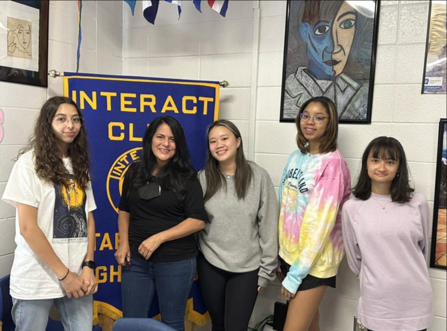 Interact+club+officers+pose+with+Dr.+Sandy+Heinsz+%28second+from+left%29.+She+presented+on+the+topic+of+student+mental+health%2C+along+with+prosocial+ways+to+deal+with+negative+situations.++