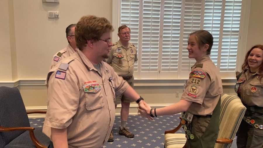 Eagle+Scout+Adeline+Harper+shakes+hands+with+an+Eagle+Scout+Board+of+Review+member.+Harper%2C+along+with+two+fellow+troopmates%2C+was+Fayette+County%E2%80%99s+first+female+scout+to+achieve+the+rank+of+Eagle.