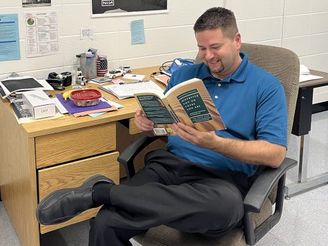 Journalism advisor and English teacher Justin Spencer is re-reading “Wherever You Go There You Are” by Jon Kabat-Zinn. The book explores mindfulness and meditation as ways of reducing stress.