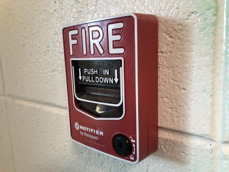 Fire alarm mounted on a wall. Fire drills are practiced too often, while the more important lockdown drills are neglected.
