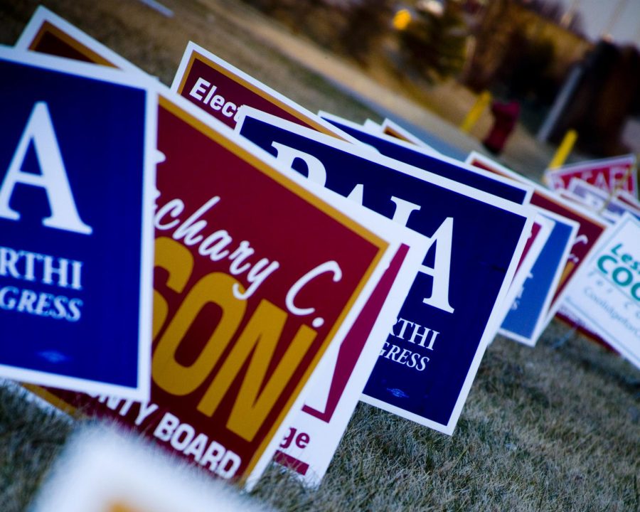 Political yard signs lined up one after another. The upcoming midterm elections will be one of the most controversial in United States history with seemingly every candidate rife with scandals. A more vigilant and active volunteer base might be the key to preventing similar elections in the future.  