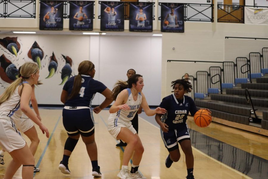 Defense led the Panthers to an easy win last Friday night. After holding Cedar Grove scoreless in the third quarter, the varsity girls defeated Cedar Grove 51-18.
