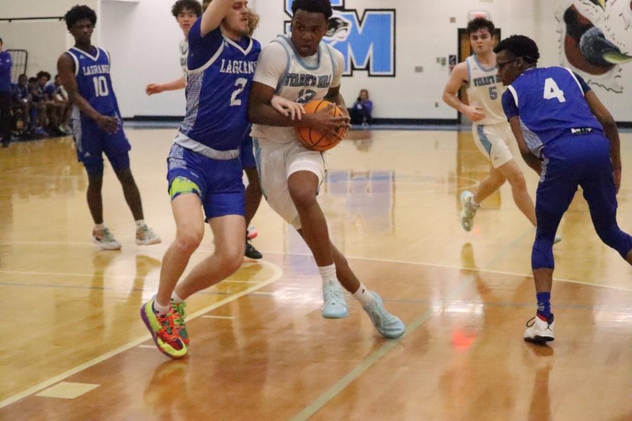 Senior Jeremiah Williamson attempts a shot. LaGrange had control over the ball, resulting in Starr’s Mill attempting to play catch up through most of the game.