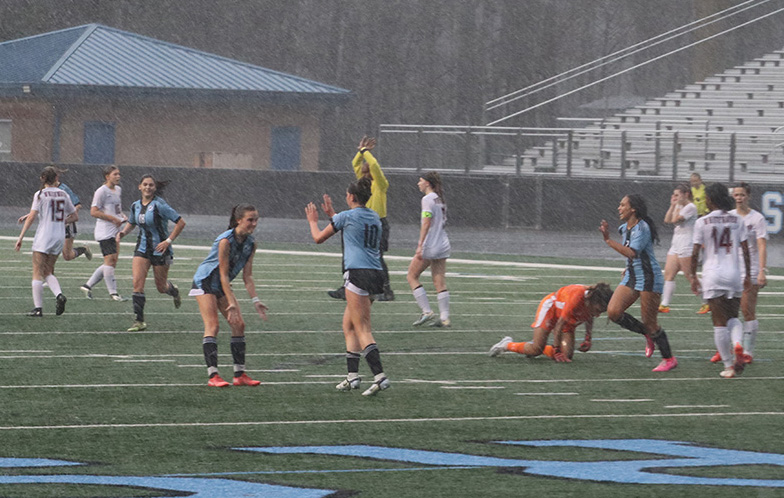 Freshmen Kendra Ivaska and Addie Grace Morrison celebrate the first goal of the game. “[Scoring first] puts us in a happy mood [and] we feel like things are going to happen for us,” head coach John Bowen said. “It really helped us settle the team down and get everybody ready to go.” 