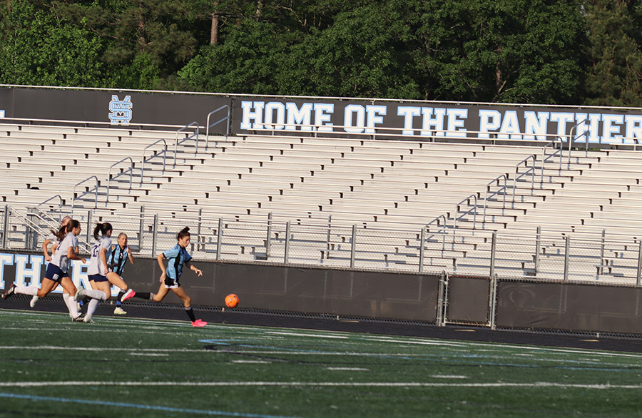 Junior Mia Hargrove dribbles the ball down the field. This was the second round of state playoffs for the Lady Panthers. After winning the first round in a mercy rule, they nearly made a streak as this match ended in triumph over the Spalding Jaguars, 9-0. The Panthers now advance to the third round of state playoffs.