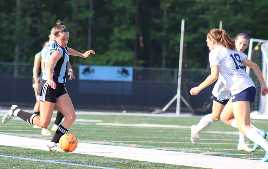 Ivaska winds up for a pass. Ivaska along with senior Lauren Gutshall, and sophomores Shaw, Isabella Large, and Kali Mcquade were named for the all-region team. The girls share the honor with coach Bowen who was named region coach of the year.