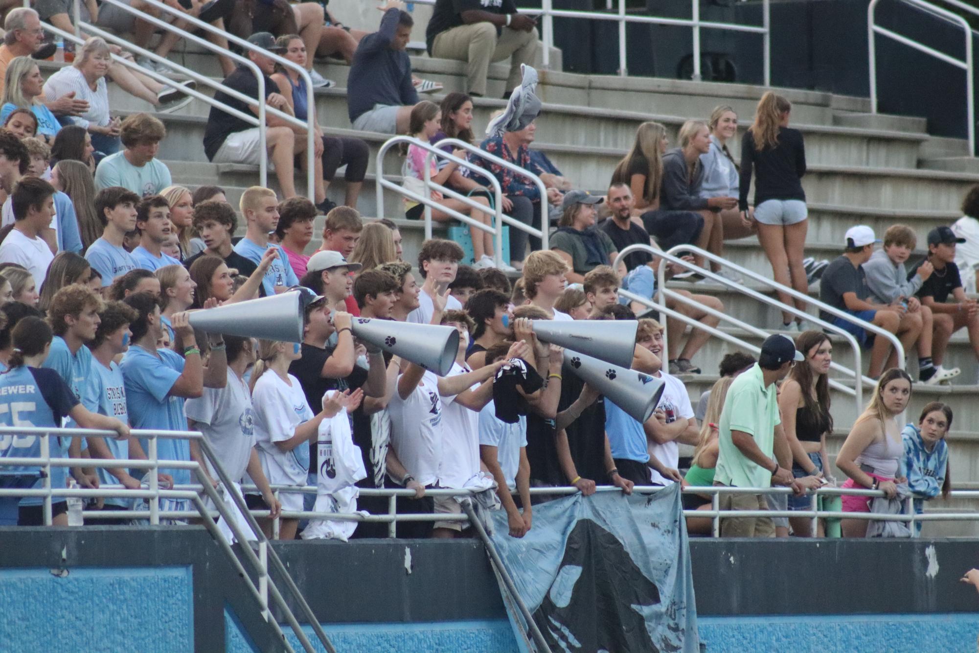 Students in the student section cheer on the football team during the first scrimmage against Union Grove. They kicked off their school spirit by sporting the school colors of blue, black, and white. The theme for this Friday’s game against Northgate is Red Out to support the cause against Muscular Dystrophy.