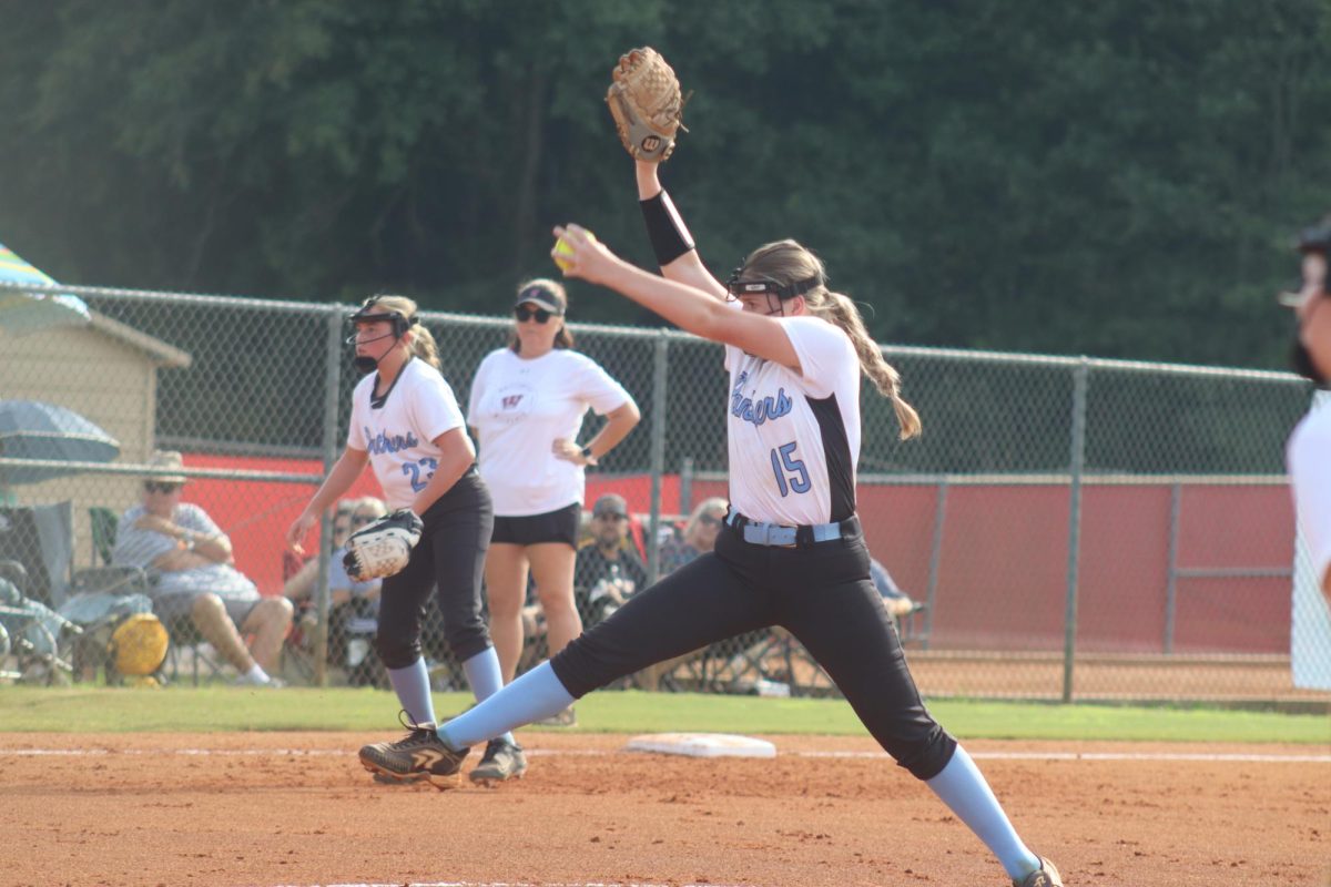 Eighth grader Ryleigh Hill winds up to deliver a pitch. The Panthers fell short of a win after putting up a fight for four innings. 