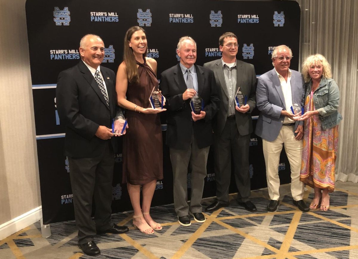 The Hall of Fames inaugural class receives their awards. The Starr’s Mill Hall of Fame was created to honor important people in school history.