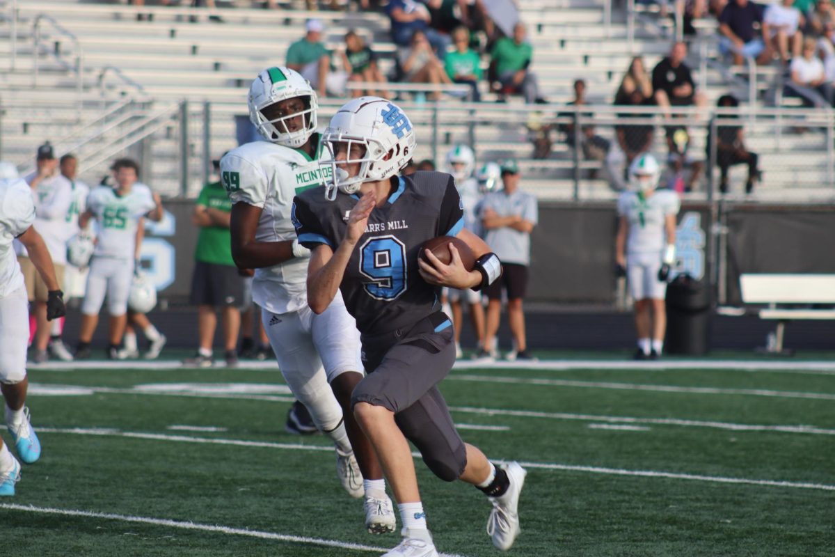 Freshman Nolan Blackwell rushes for a big gain late in the first half. Starr’s Mill and McIntosh battled back and forth until late in the fourth quarter. 