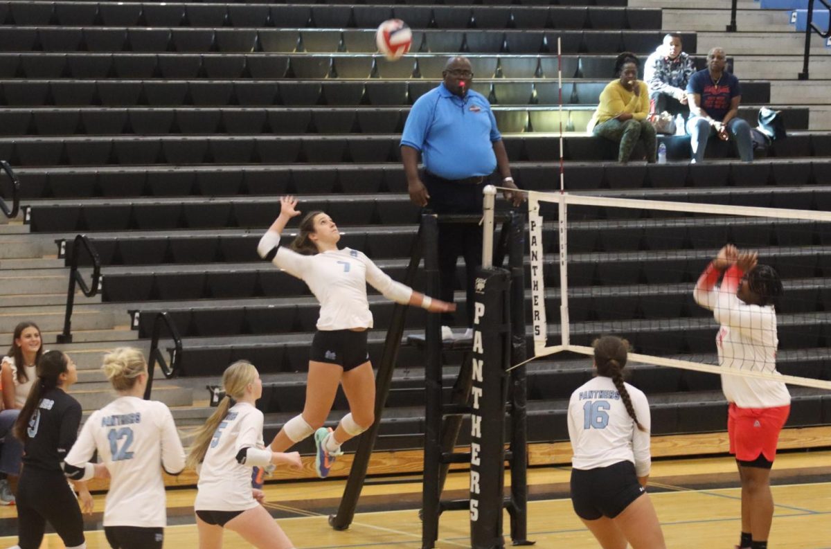 Senior Kari Smith leaps to hit a kill. Starr’s Mill volleyball defeated Baldwin 3-0 to advance to the AAAA quarterfinals. The Panthers will face Pace Academy in the Elite 8 for the second year in a row.