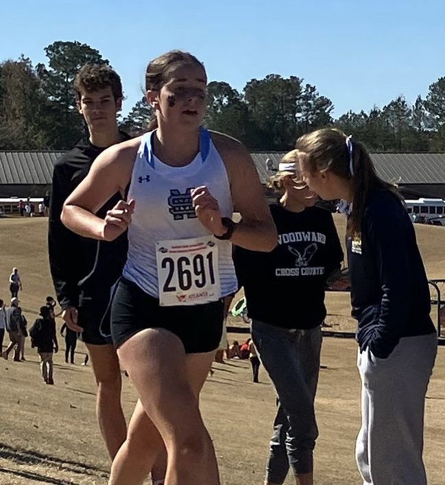 Sophomore Kendra Ivaska competes in the state meet. She finished with a time of 19 minutes and 45.22 seconds. The varsity girls team, composed of mostly sophomores, finished second overall.