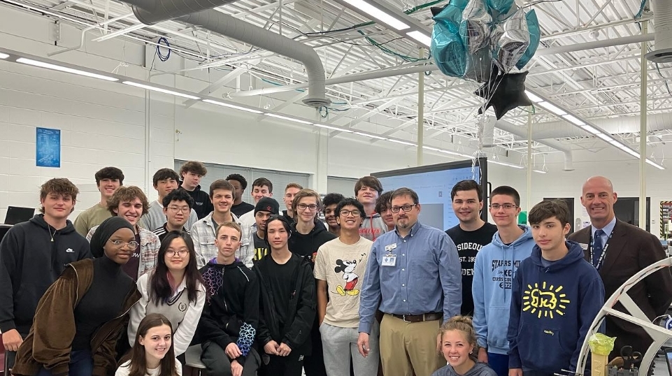 Engineering and AP Computer Science teacher Rob Bell surrounded by students in his AP Computer Science class. Bell said he was shocked and humbled to be selected by his Starr’s Mill peers.