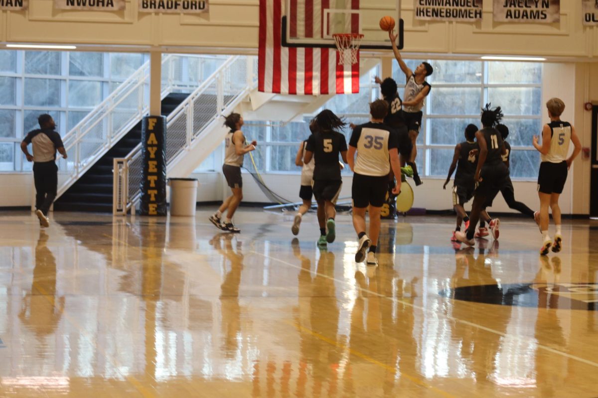 Junior Jory Williams makes a layup during the teams loss against the Tigers. Fayette County defeated Starr’s Mill 39-38.
