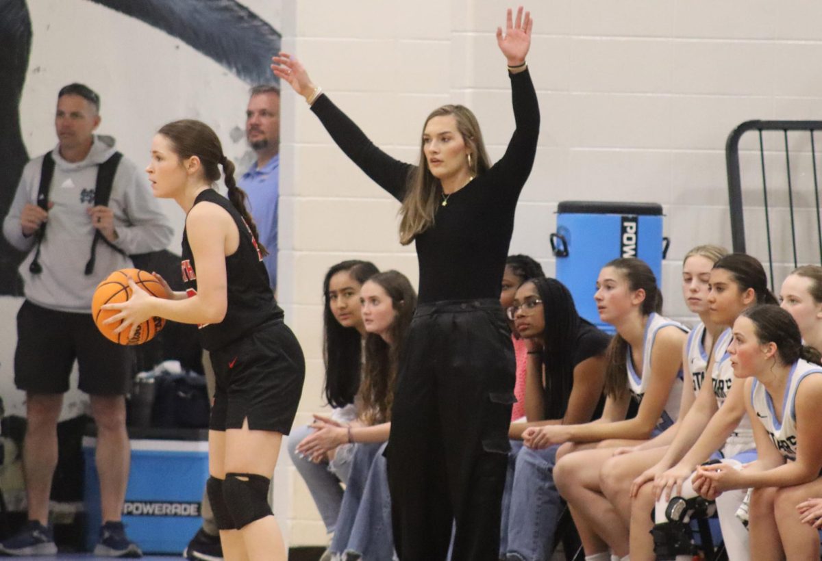 Anna+Atha+coaches+the+defense+during+the+state+playoff+quarterfinals+game+against+North+Oconee.+She+led+the+team+to+a+41-19+record+overall+and+a+region+record+of+22-6.+This+season+the+team+made+it+to+the+Elite+8+for+the+first+time+in+school+history.