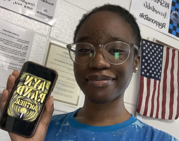 Junior Dola Dedeigbo read “Anthem” by Ayn Rand. It is a dystopian fiction novella that explores the suppression of individualism. 