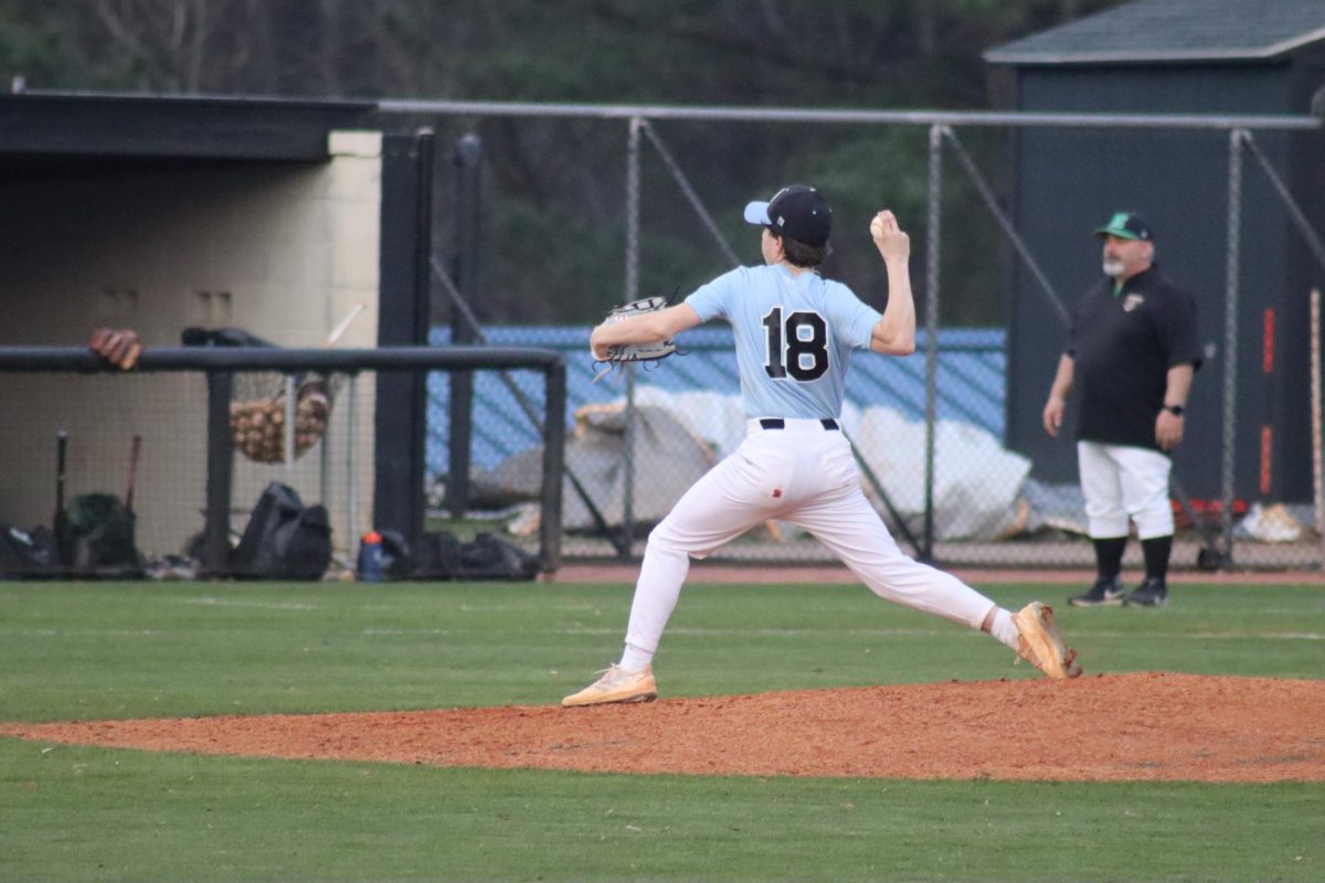 Freshman Seth Lanson delivers a pitch. Lanson pitched a complete game shutout and only gave up 3 hits in the 6-0 win.