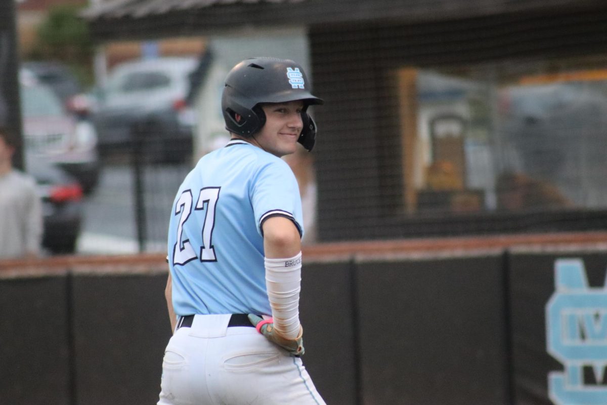 Sophomore pitcher Brock Rein smiles during the double header against Riverdale. After winning 18-0 and 15-0, Starr’s Mill ended region play undefeated.