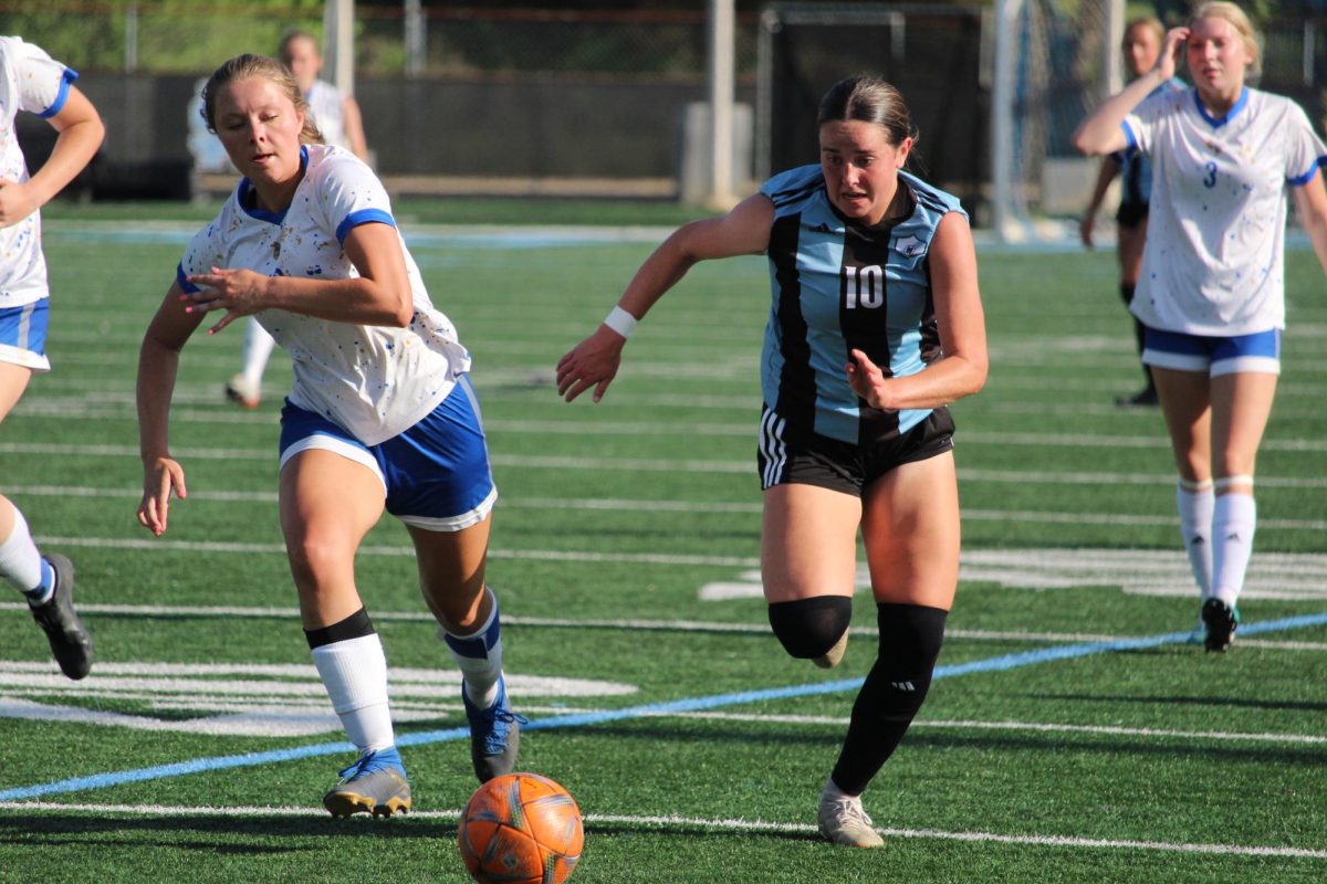 Sophomore+Kendra+Ivaska+out+dribbles+the+defender%2C+making+her+way+to+goal.+Ivaska+led+the+Lady+Panthers+to+victory+with+four+of+the+team%E2%80%99s+goals.