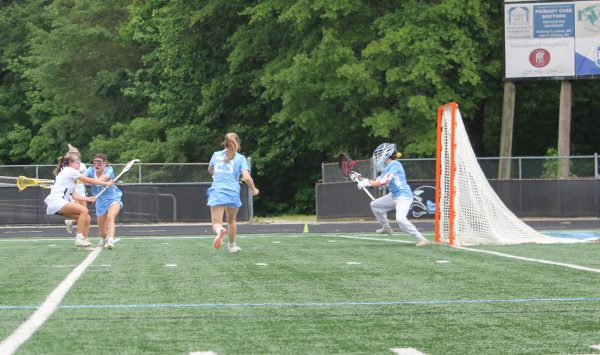 Junior Sarah Marshburn fires a shot past the Lovett defense.. Starr’s Mill defeated Lovett 10-8 to advance in the AAAA state playoffs. 