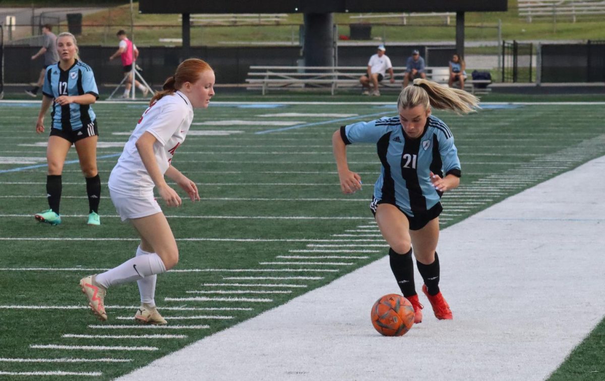 Junior Kate Hillegas manages to gain possession of the ball, driving it toward the goal. After outsourcing opponents 19-0 in the first two rounds of the playoffs, the Lady Panther soccer season ended in a 2-1 loss to North Oconee.