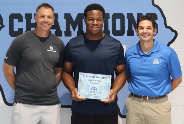 Junior Jared Moore was selected as Farmers Insurance Player of the Week for his hard work and setting an example for younger athletes. Moore won state championships in shot put and discus. He broke his own school record in discus.