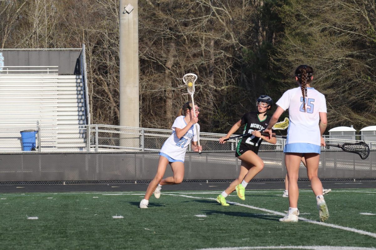 Eighth grader Luci Harvey rushes up the field to score. Junior varsity girls lacrosse ended the season on a seven-game winning streak after defeating Lovett 14-2. The team ended the season 9-2 overall.