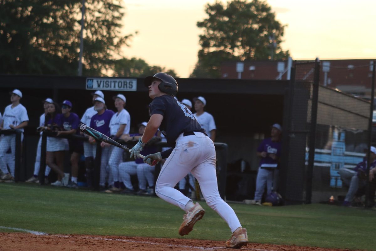 Junior Parker Williams tracks a ball he hit. He pitched for the majority of the second game against the Cartersville Hurricanes where the Panthers lost in the sweet sixteen.