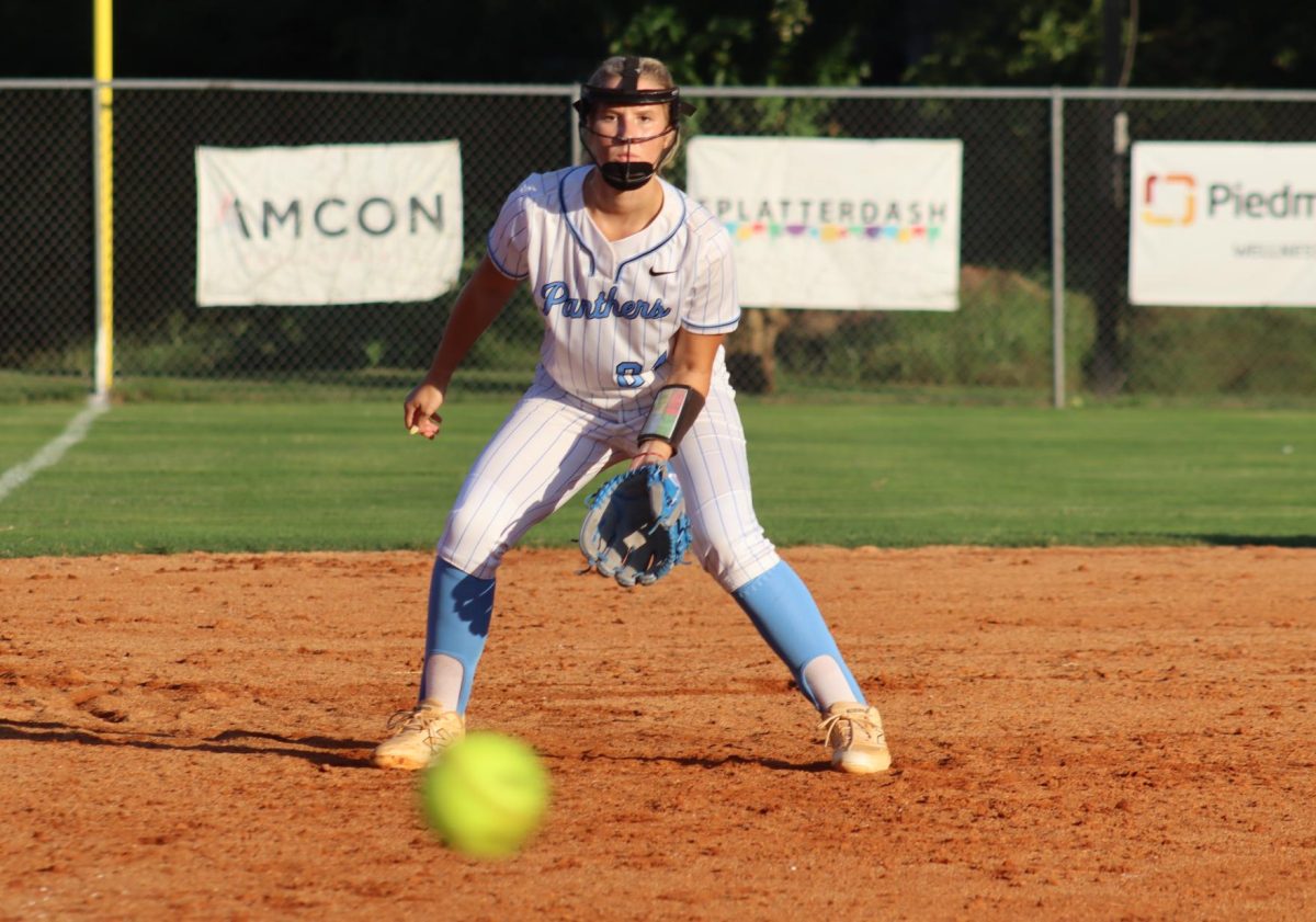 Junior Kayla Peavyhouse readies herself to catch an on coming pitch and deny McIntosh a run. Starr’s Mill defeated McIntosh by six runs for an early season victory.