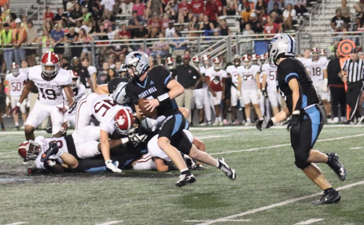 The Panthers run the ball down the field in a game against the Northgate Vikings last Friday. This year, the Panthers have 12 seniors and four of them have not played in years.