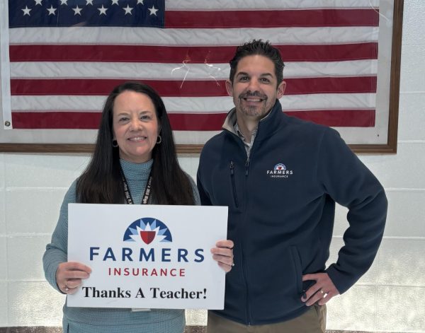 Speech-language pathologist Shannon Gagliano was awarded as the Golden Apple recipient for January. She was selected by teacher Sean Hickey for making a specific group of kids feel special and included. 