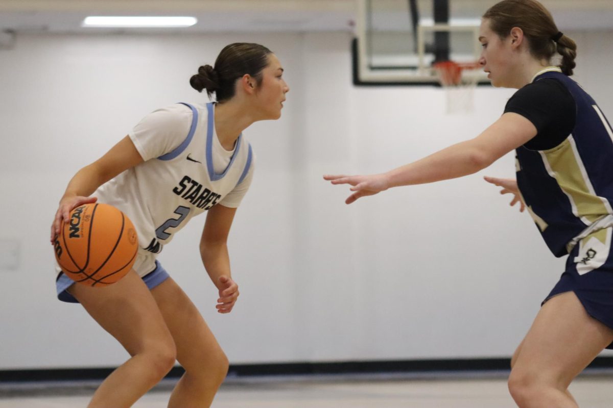 Sophie Olson faces off against a St. Pius Lioness. Through determination and team work, Starr’s Mill defeated the Lions, 52-43, to advance to the second round of the state playoffs. The Panthers travel to Jones County on February 27. 