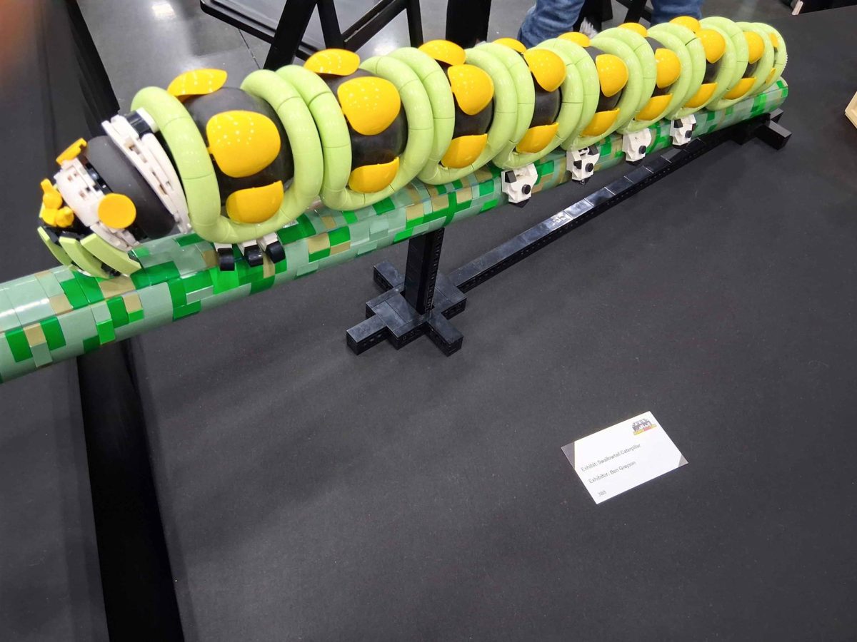 This is a super-scaled up caterpillar build with a branch. This build expresses how people can express their love for nature and enjoy these plastic toys.