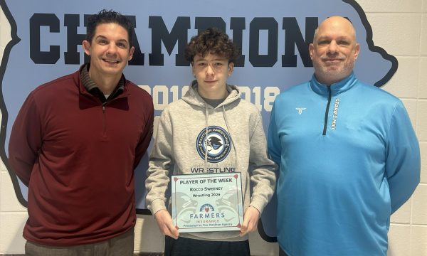 Tim Monihan and Farmers Insurance recognize sophomore Rocco Sweeney as the 11th Player of the Week for the winter sports season. Wrestling coach John Steiner chose him for his hard work this season and a great past three weeks. 
