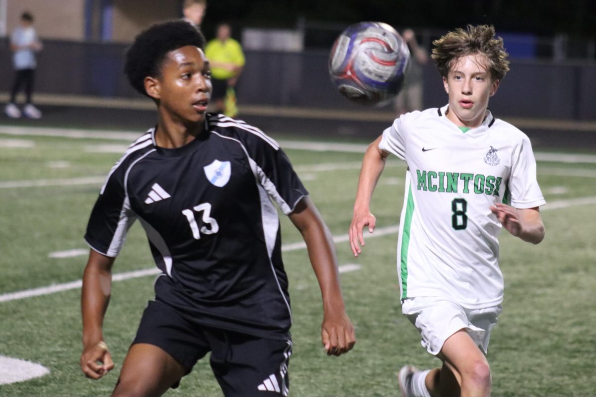 Starr’s Mill freshman Josh Byrd and McIntosh sophomore Zill Wilson go for the ball. Starr’s Mill held McIntosh to one goal in the first half, but the Chiefs pulled away in the second half to win the annual Battle of the Bubble game, 5-0. 