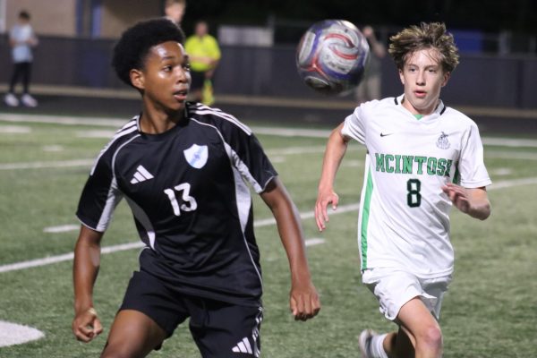 Starr’s Mill freshman Josh Byrd and McIntosh sophomore Zill Wilson go for the ball. Starr’s Mill held McIntosh to one goal in the first half, but the Chiefs pulled away in the second half to win the annual Battle of the Bubble game, 5-0. 